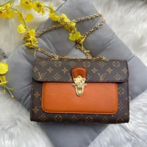 Vuitton Victorie Tan Shoulder Bag