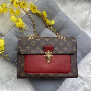 Vuitton Victorie Monogram Maroon Hand Bag